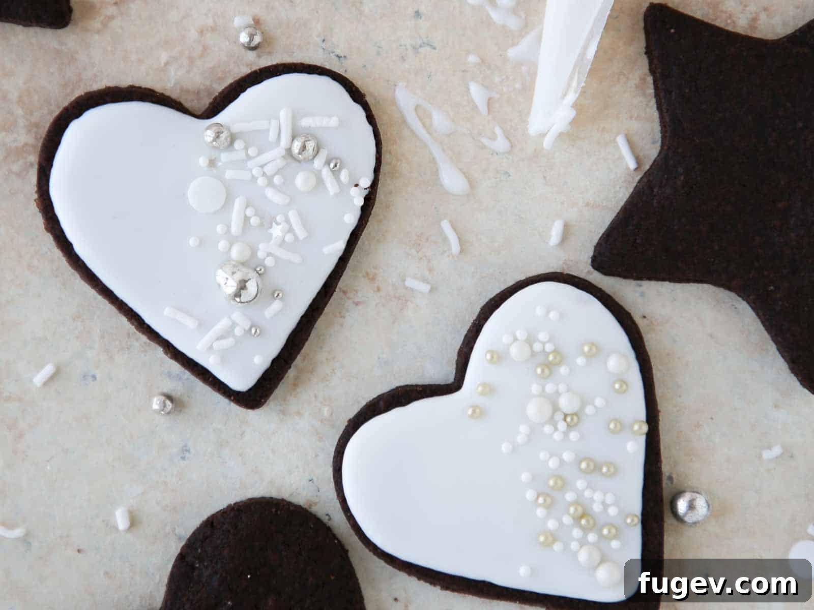 Decadent Chocolate Sugar Delights 3 white decorated hearts for weddings.