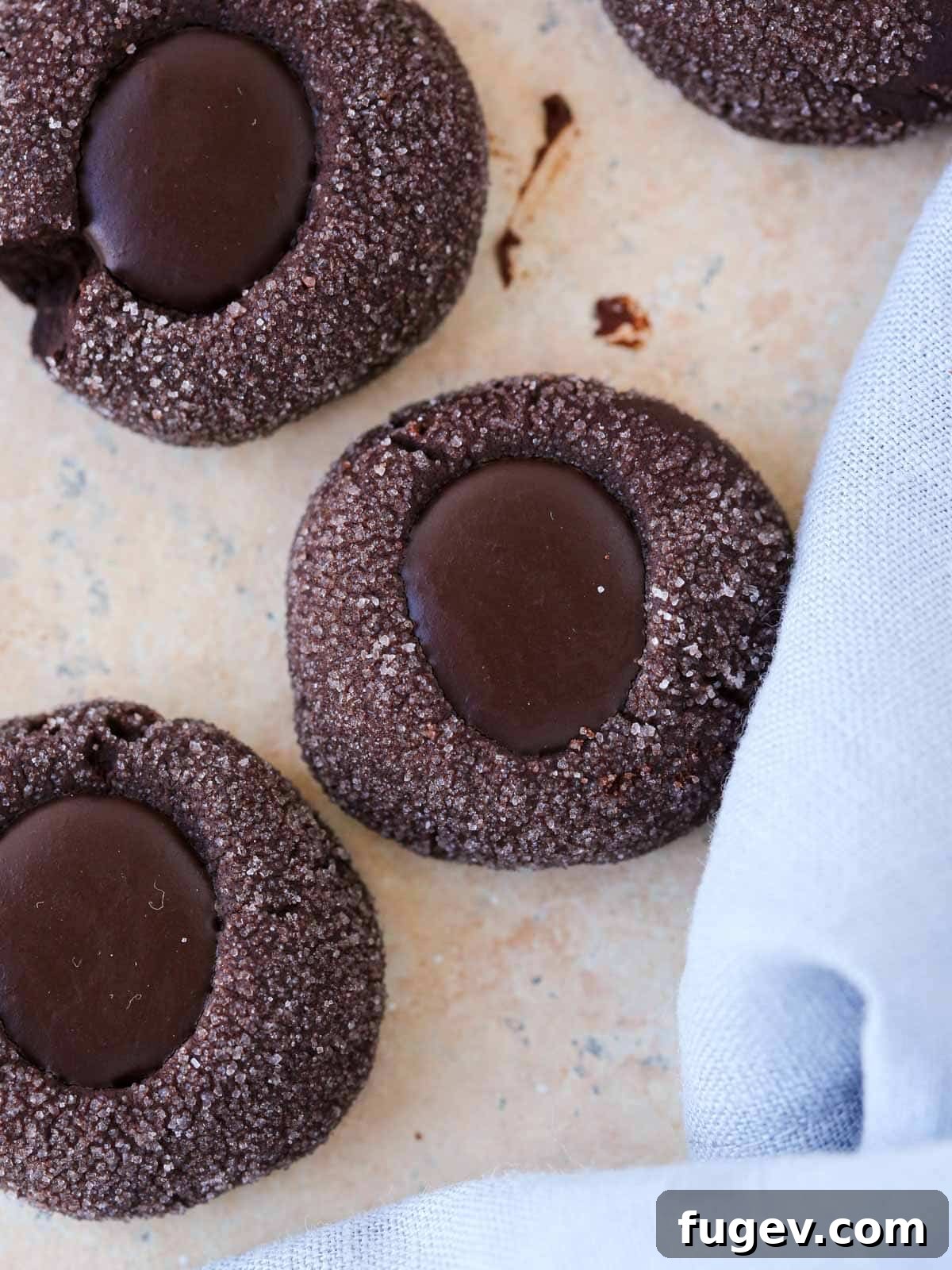 Velvety Chocolate Thumbprint Wonders 15 A single perfectly filled chocolate thumbprint cookie with luscious ganache in the center.