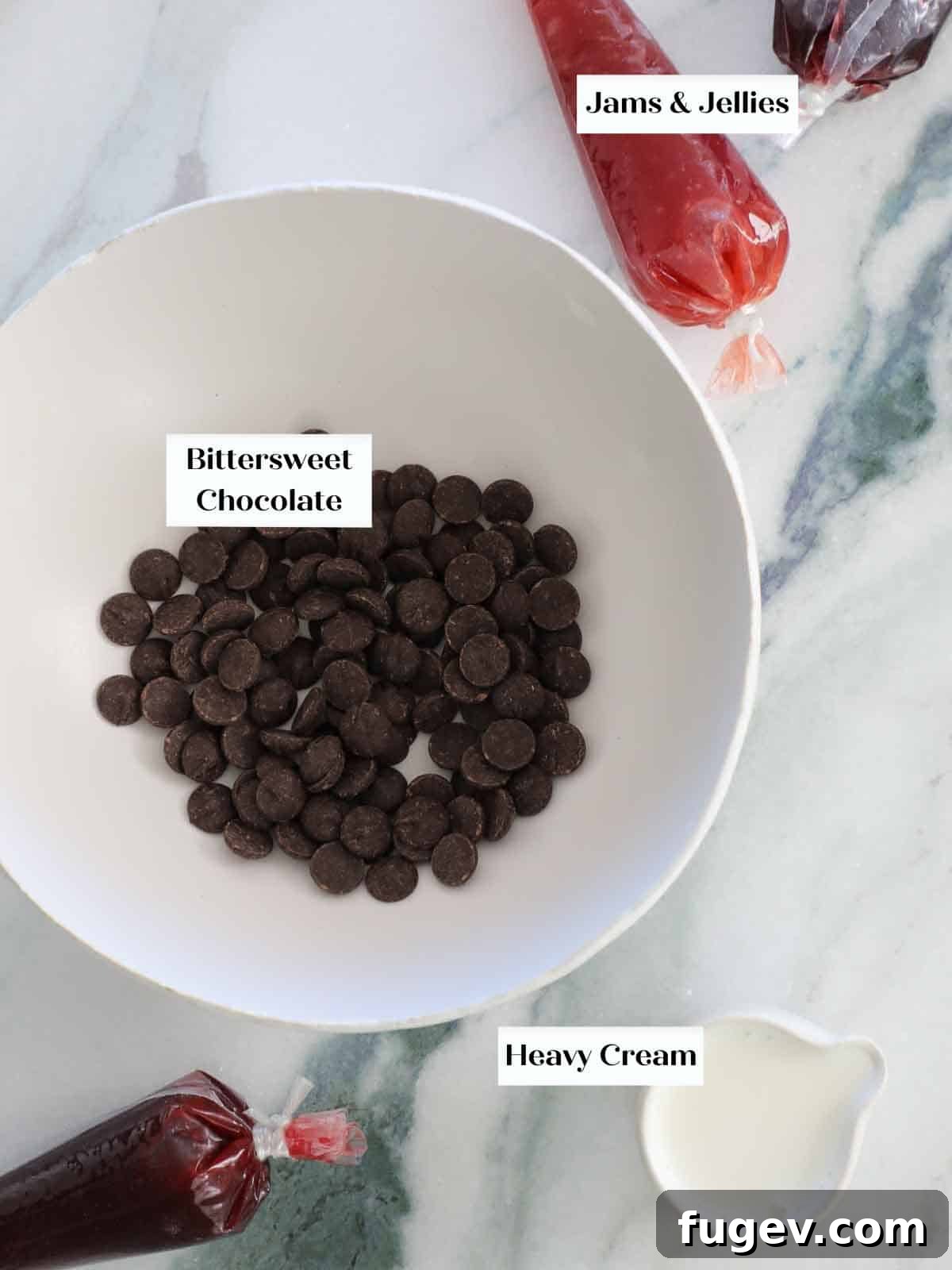 Velvety Chocolate Thumbprint Wonders 5 Ingredients specifically for the chocolate ganache filling: high-quality chocolate chips and heavy cream.