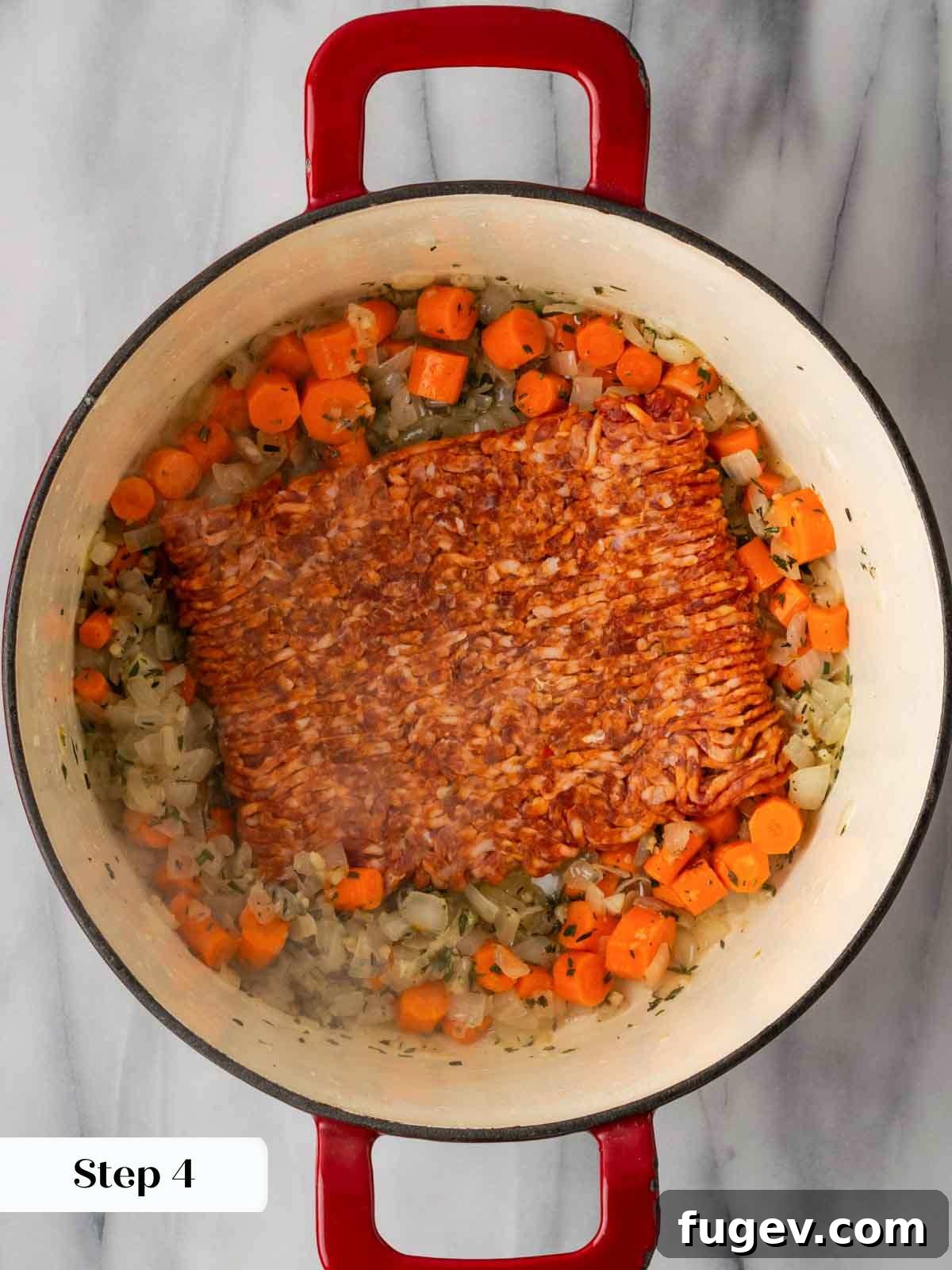 Hearty Italian Sausage Soup 7 Spicy hot Italian sausage browning alongside an assortment of softened vegetables in a large, heated pot, developing rich, savory flavors.
