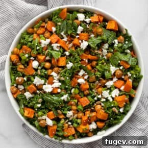 Sweet potato and chickpea kale salad in a bowl.