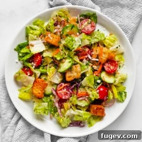 House salad on a plate with fresh vegetables.