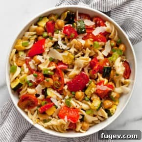 Roasted vegetable chickpea pasta salad served in a bowl.