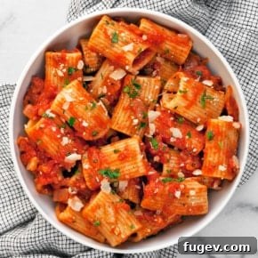 Rigatoni with tomato sauce in a bowl.