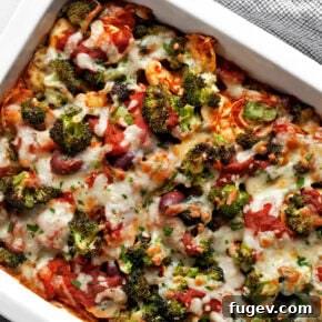 Vegetarian pasta bake with tortellini in a rectangular dish.