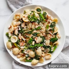 Lemon rapini pasta on a plate.