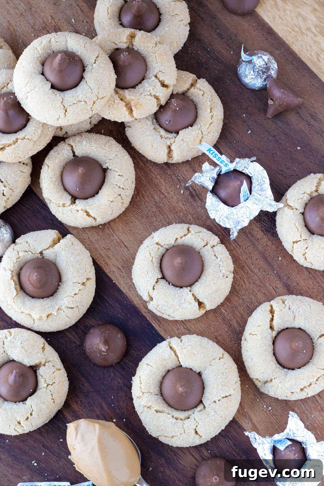 Peanut Butter Dream Drops 4 Freshly baked Peanut Butter Blossoms arranged with unwrapped Hershey's kisses
