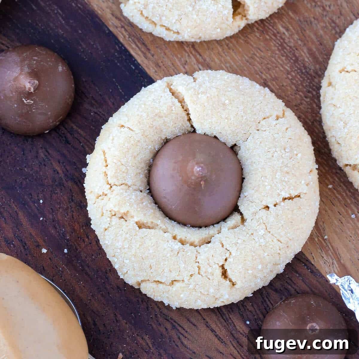 Peanut Butter Dream Drops 7 Top view detail of Peanut Butter Blossoms, highlighting their sugar coating and chocolate kisses