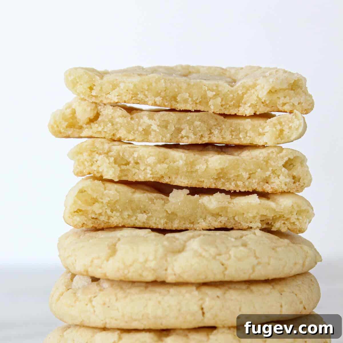 25 Deliciously Simple Christmas Cookies 16 Chewy Sugar Cookies Stacked close up detail.