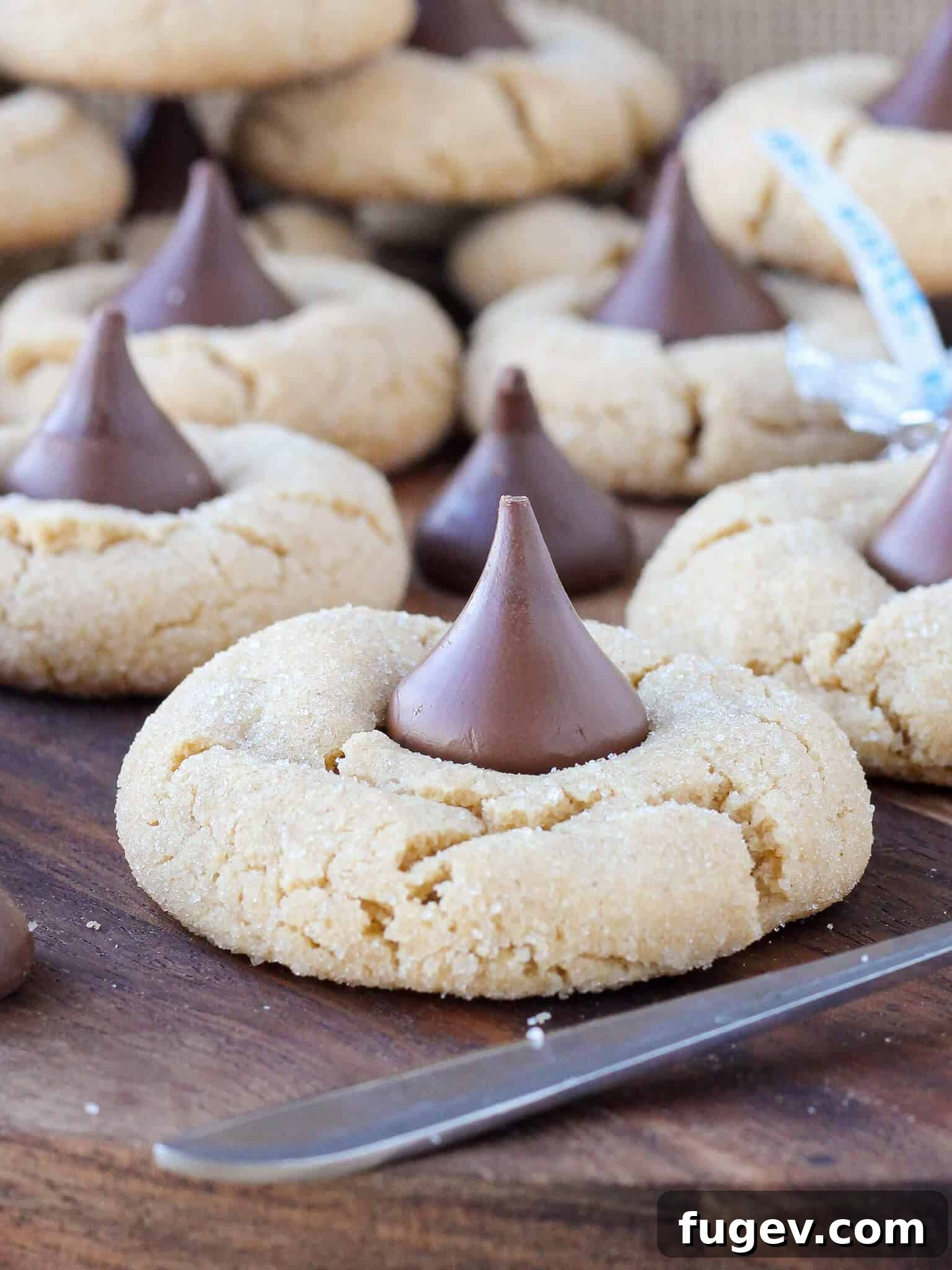 25 Deliciously Simple Christmas Cookies 18 Peanut Butter Blossoms fresh baked easy Christmas cookies.