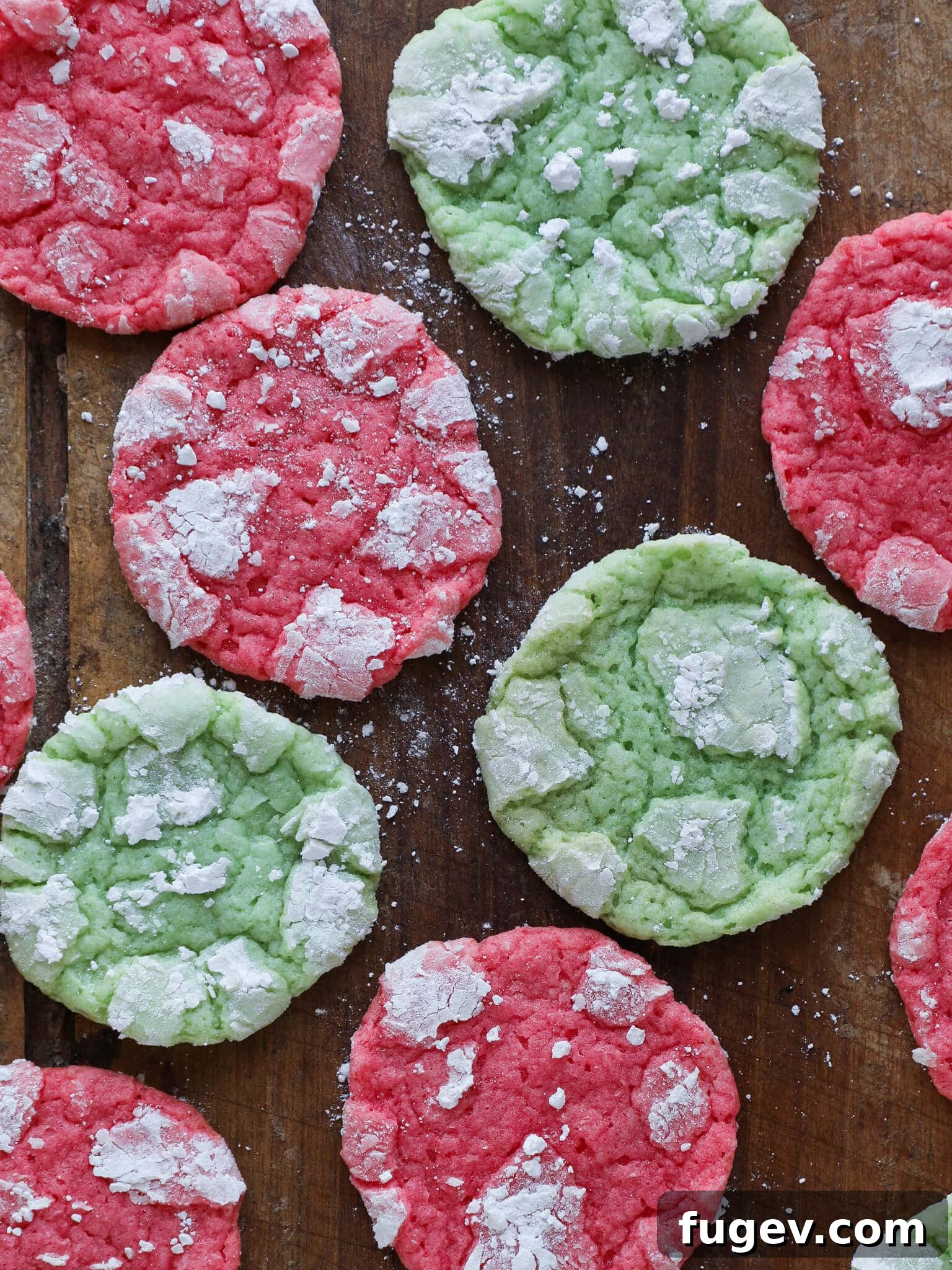 25 Deliciously Simple Christmas Cookies 8 Festive Almond Crinkle Cookies arranged on wooden surface easy Christmas cookies.