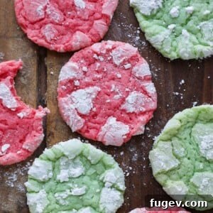 Festive Almond Crinkle Cookies red and green cookies on wood
