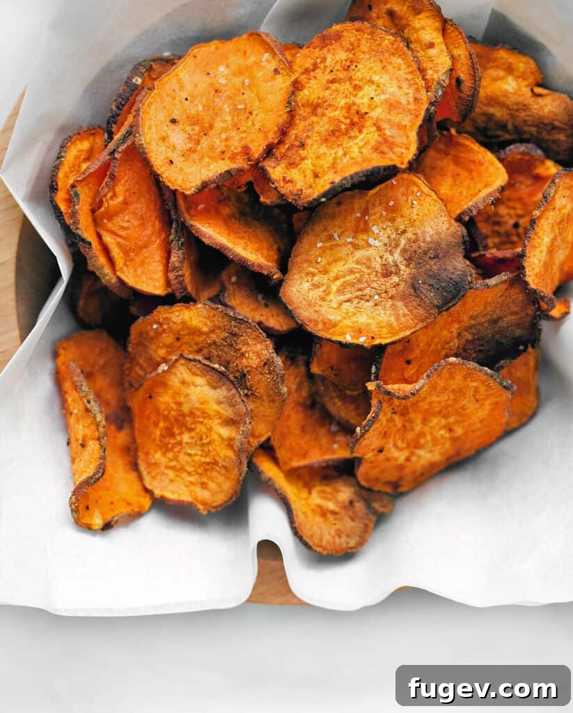 Crispy Baked Sweet Potato Chips 4 Sweet potato slices coated in spices before baking