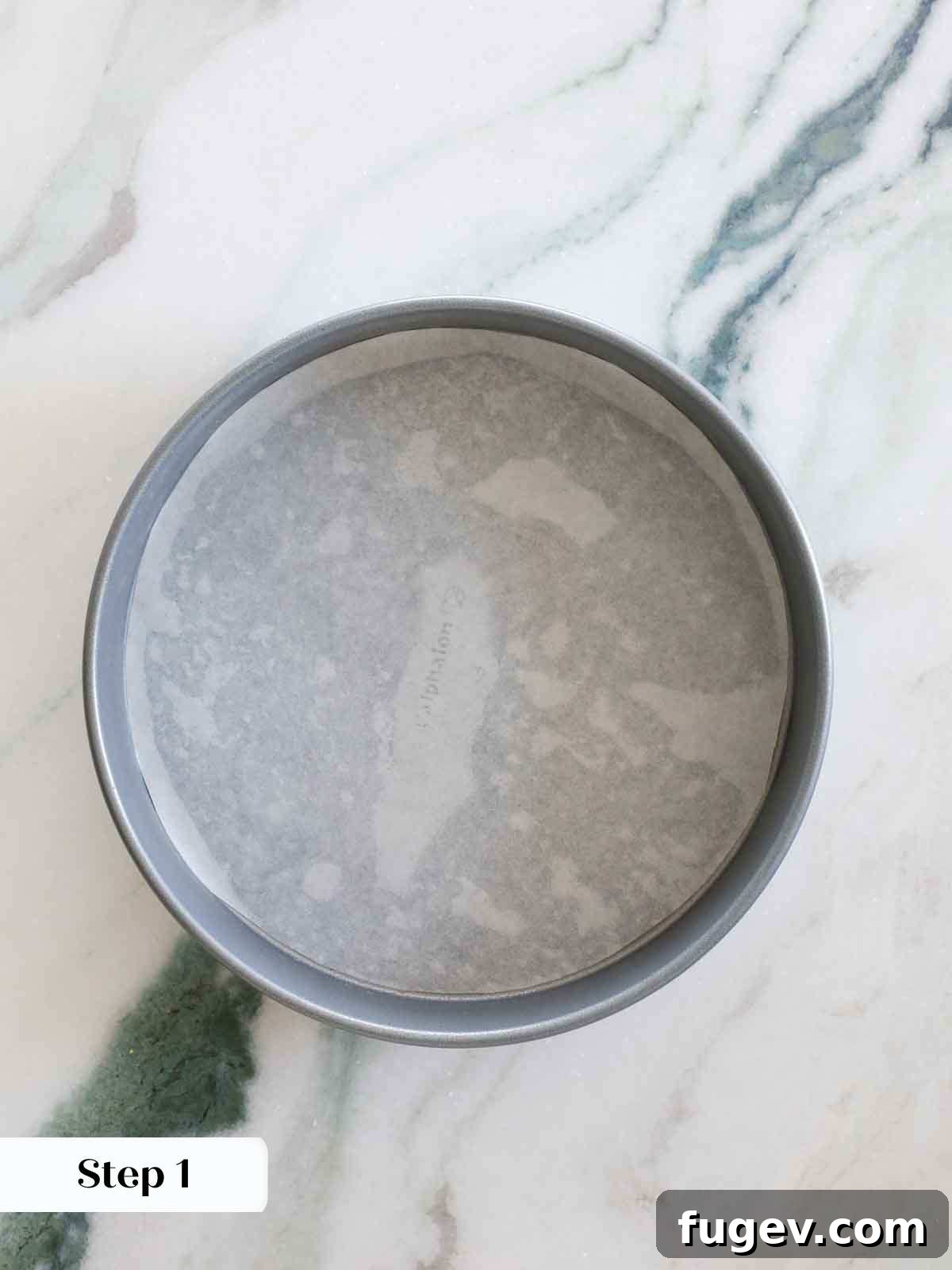 Zesty Mediterranean Olive Oil Cake 7 round cake pan lined with parchment.