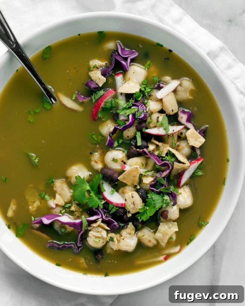 Soulful Green Chile Posole 2 Green Chili Posole with fresh garnishes in a white bowl