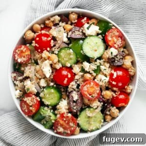 Vibrant Greek Quinoa Medley 6 A close-up of the delicious Greek quinoa salad in a serving bowl.