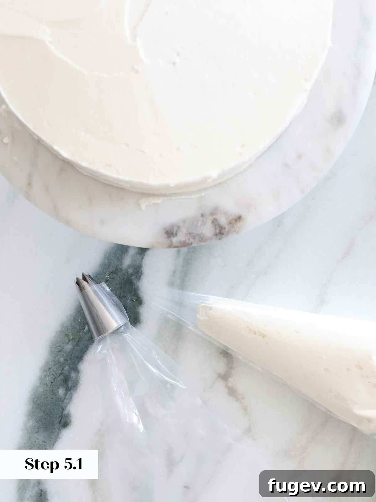 Velvet Vanilla Cake Recipe 26 A piping bag fitted with a star tip, ready for cake decoration.