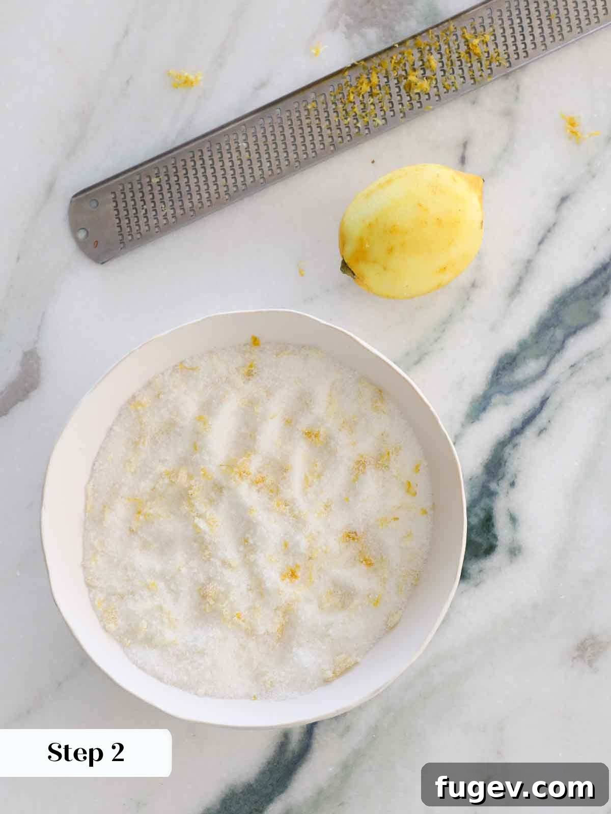 Zesty Lemon Delights 7 lemon zest combined with sugar in white bowl.