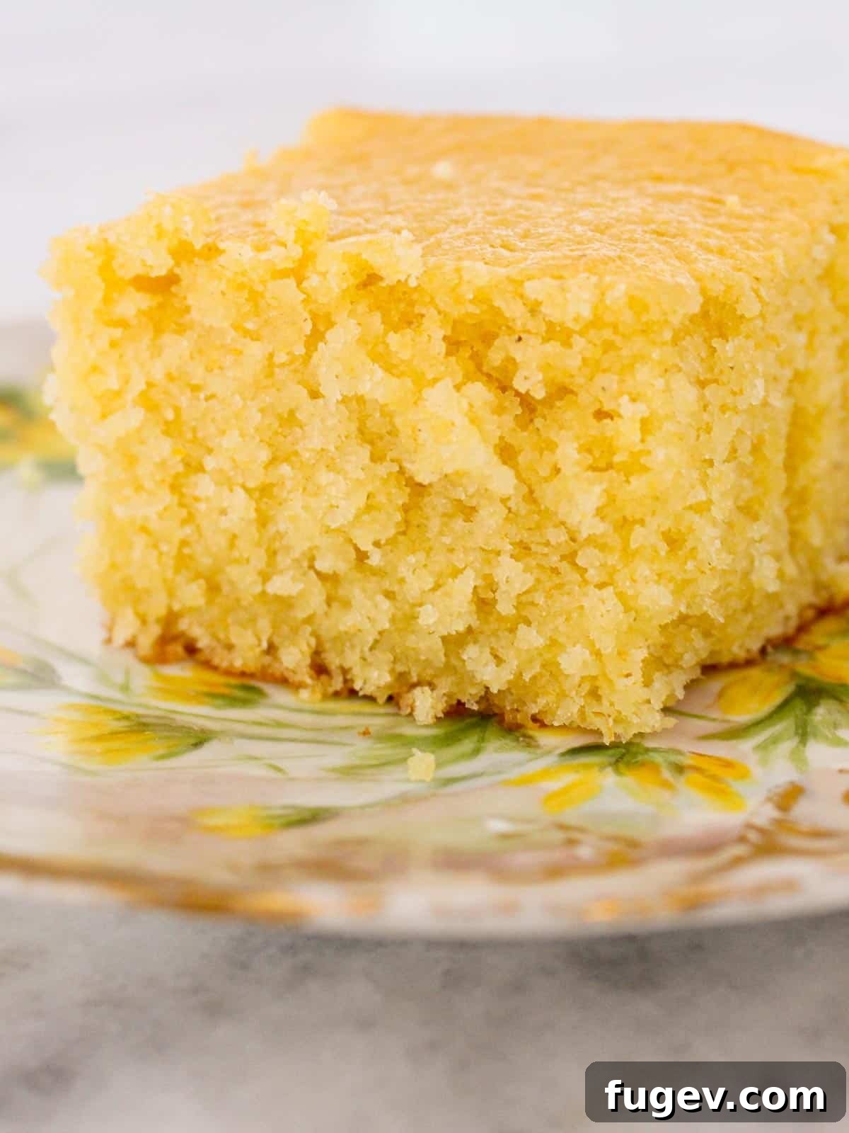 Sweet Cornbread Perfection 2 moist cornbread on vintage plate.