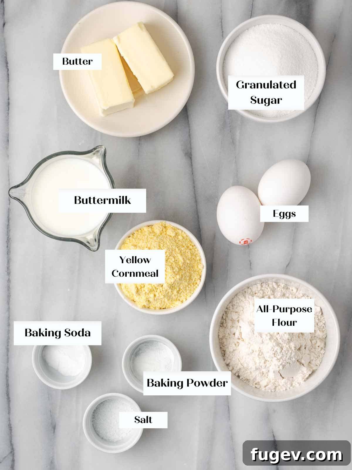 Sweet Cornbread Perfection 4 sweet cornbread ingredients on marble.