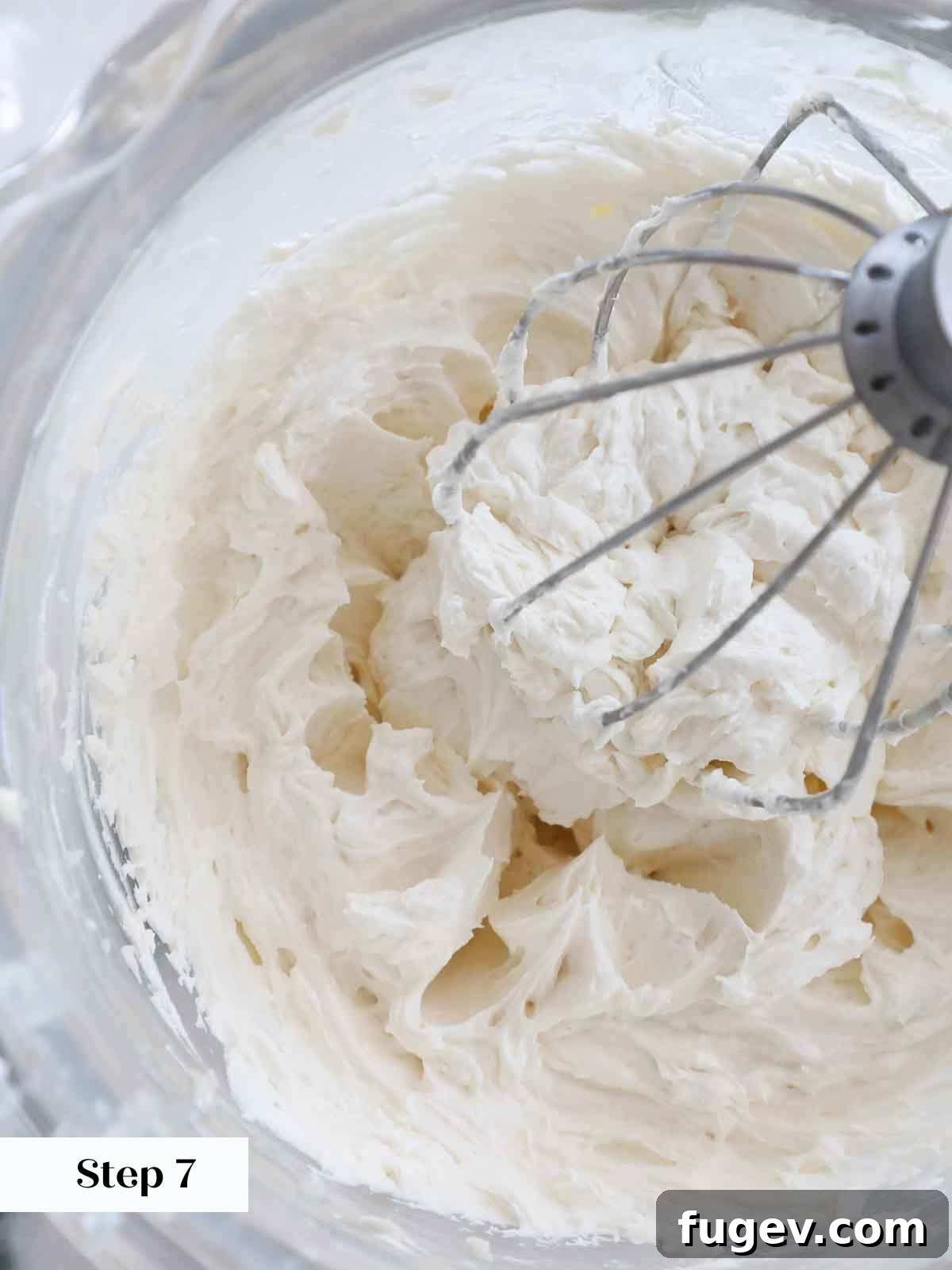 Silky Smooth Ermine Buttercream 13 Smooth and light fluffy ermine frosting in a mixing bowl, showcasing its delicate texture.