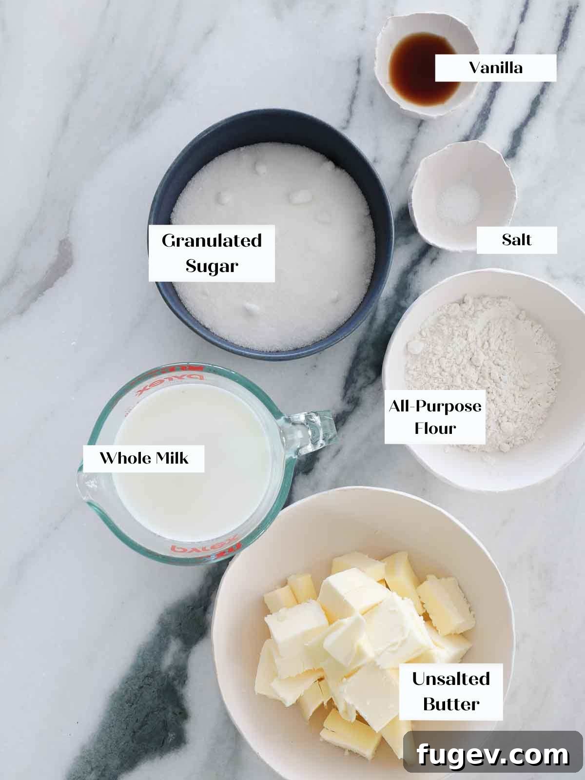 Silky Smooth Ermine Buttercream 4 All the essential ingredients for ermine frosting neatly arranged on a marble surface.