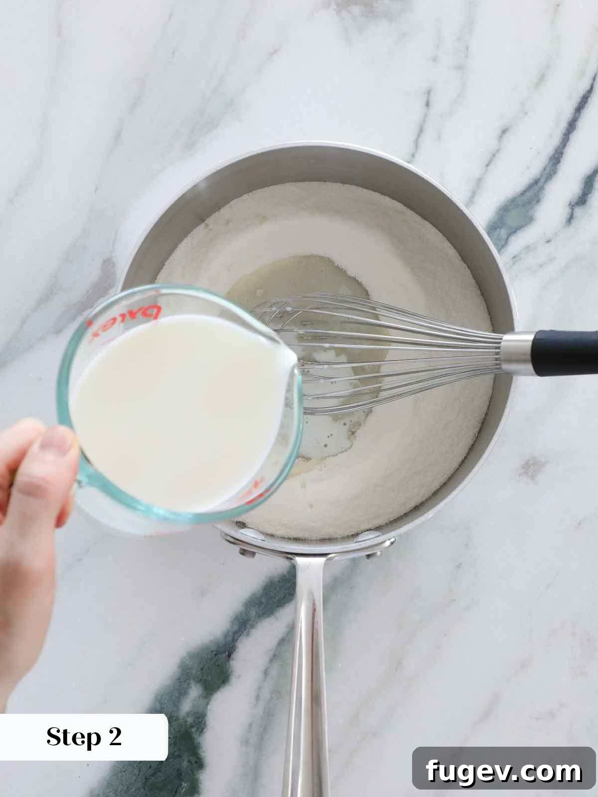 Silky Smooth Ermine Buttercream 7 Flour mixture thickening in the saucepan, showing early stages of cooking for the ermine frosting base.