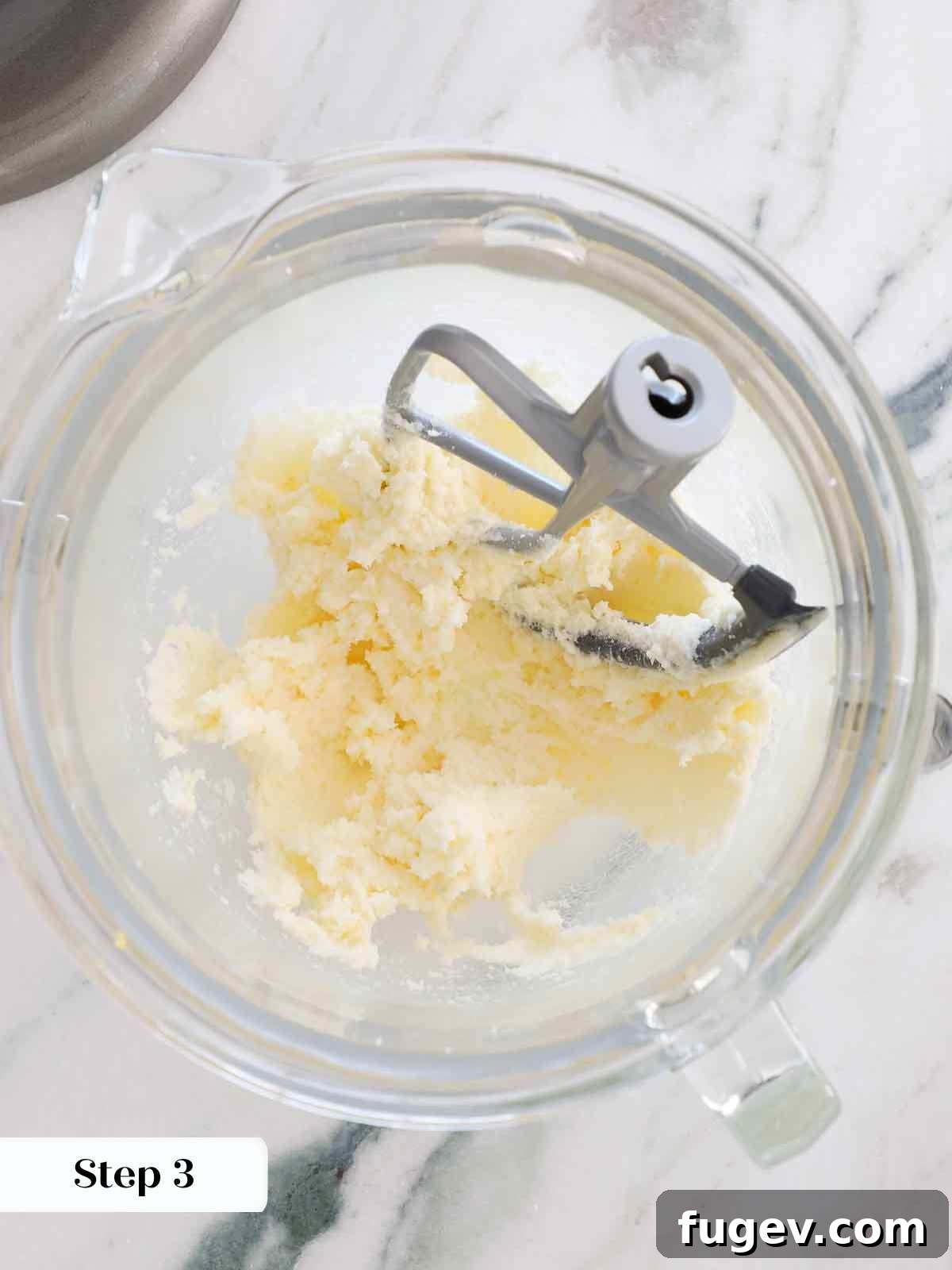Golden Vanilla Bliss 7 Perfectly creamed butter and sugar, forming a light and fluffy base for the vanilla cupcakes.