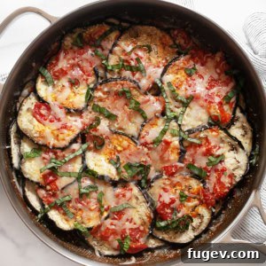 Eggplant casserole in a skillet.