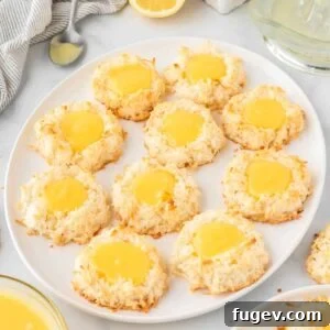 Lemon Macarons with delicate flaked coconut, showing their beautiful texture.