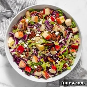 Apple pecan salad in a bowl.