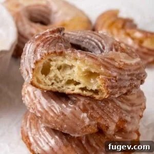 cruller with bite to show interior.
