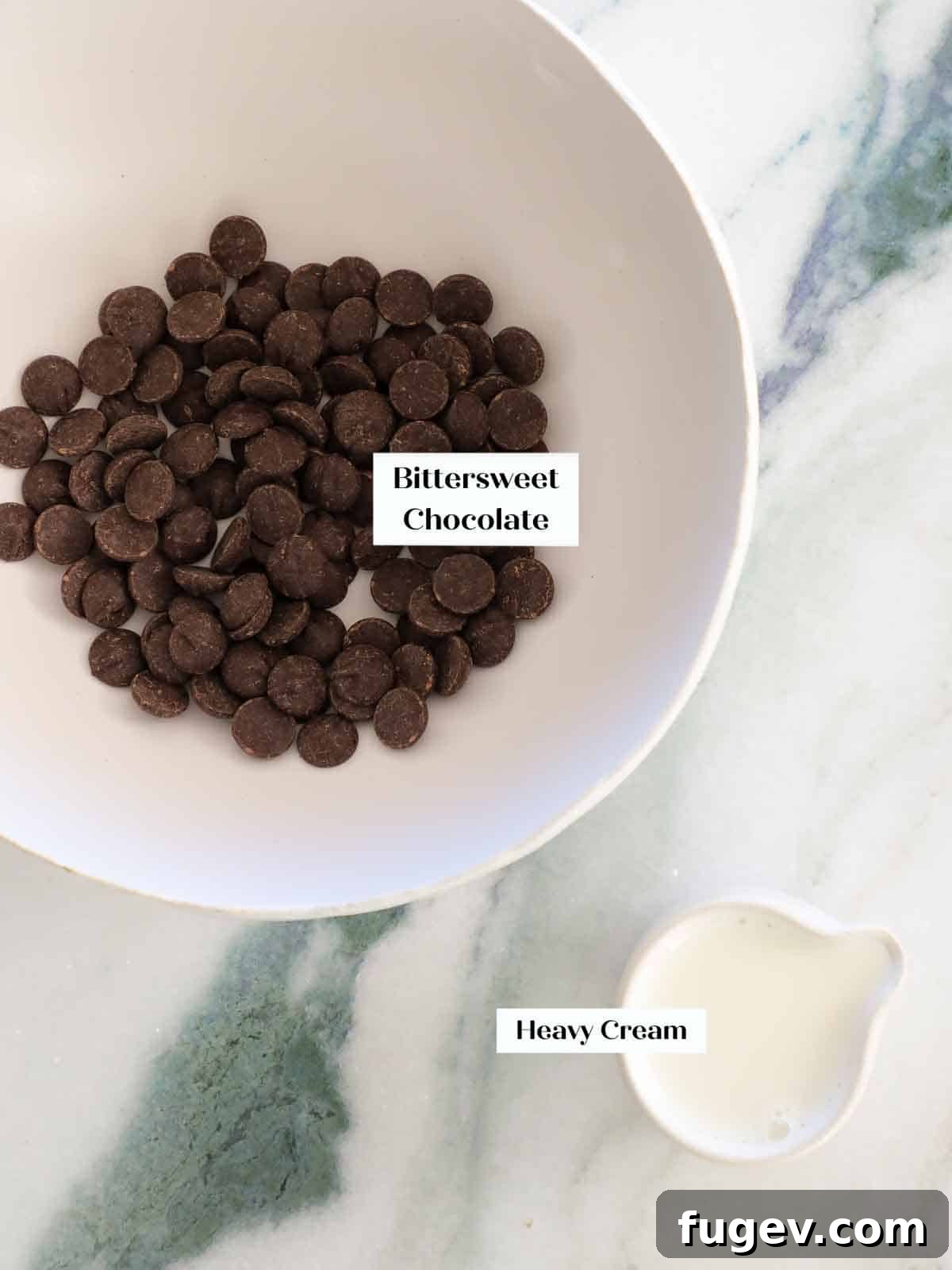 Mastering Chocolate Ganache 4 Close-up of chocolate ganache ingredients: high-quality chocolate pieces and rich heavy cream.