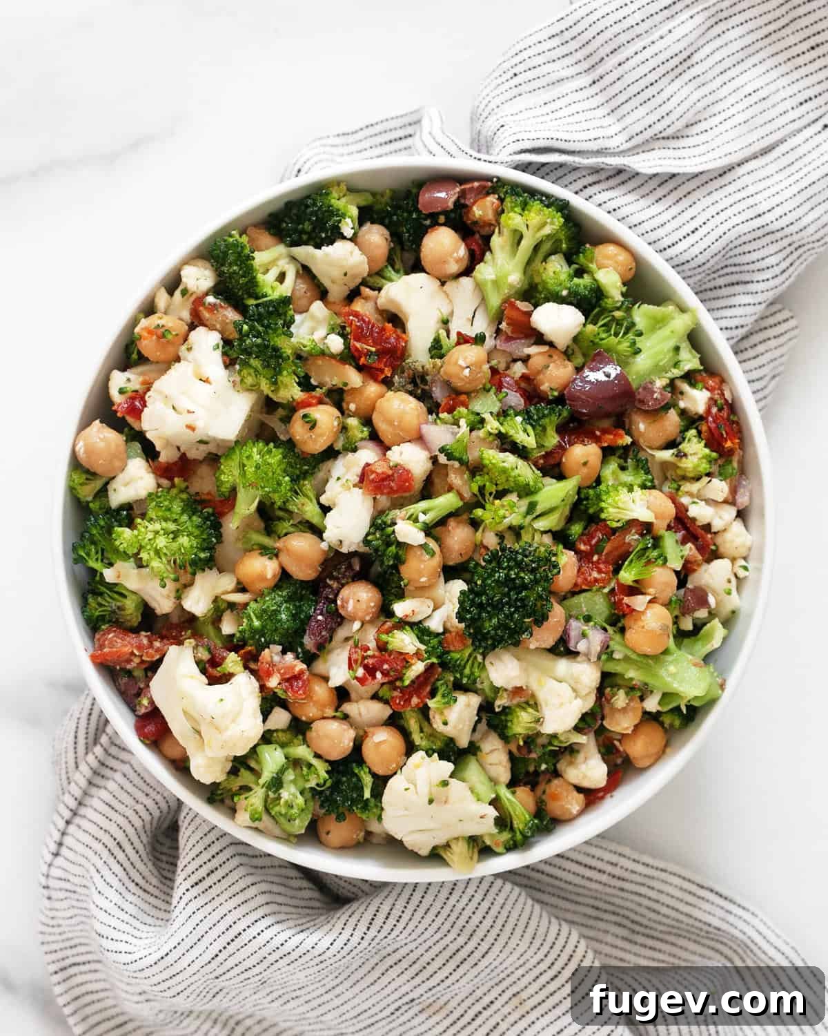 Garden Crisp Florets Salad 2 A vibrant and crisp Broccoli Cauliflower Salad in a serving bowl, ready to be enjoyed.