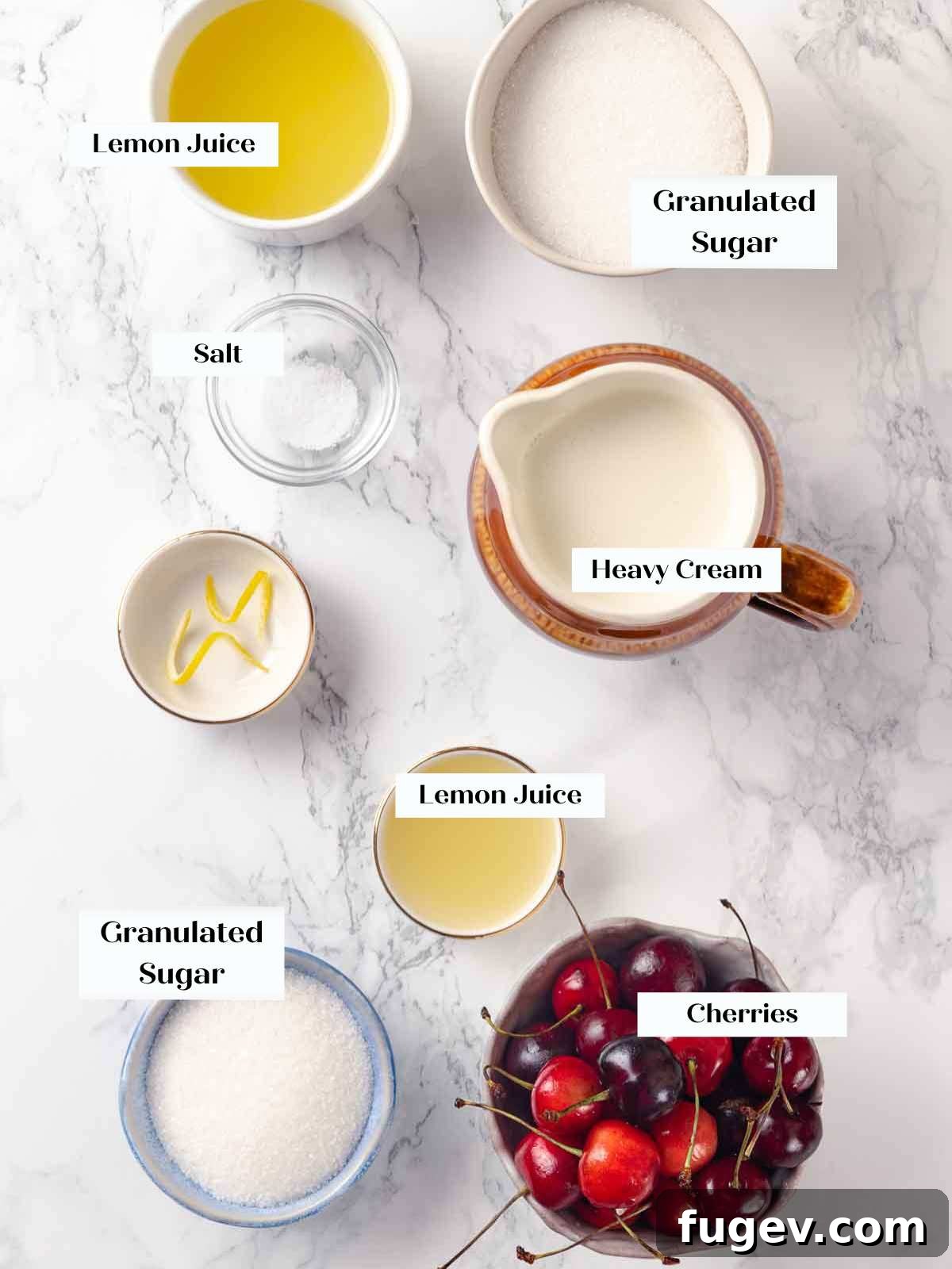 Zesty Lemon Cream 4 Individual ingredients for lemon posset and cherry sauce laid out, including fresh lemons, heavy cream, sugar, kosher salt, and fresh cherries, illustrating the recipe's simplicity.