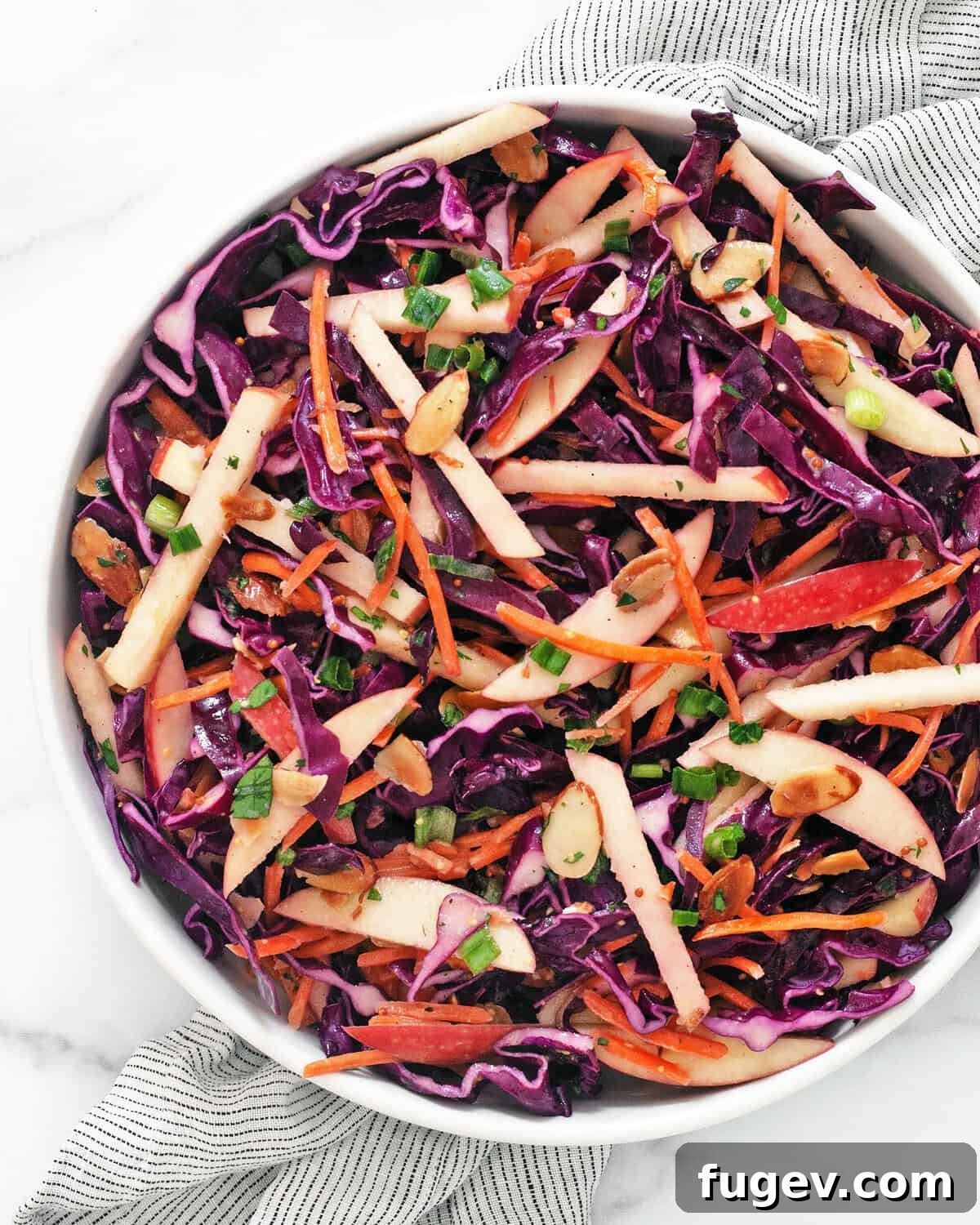 Crimson Cabbage Crunch 2 A beautifully presented Red Cabbage Salad in a bowl, showcasing its vibrant colors and fresh ingredients.
