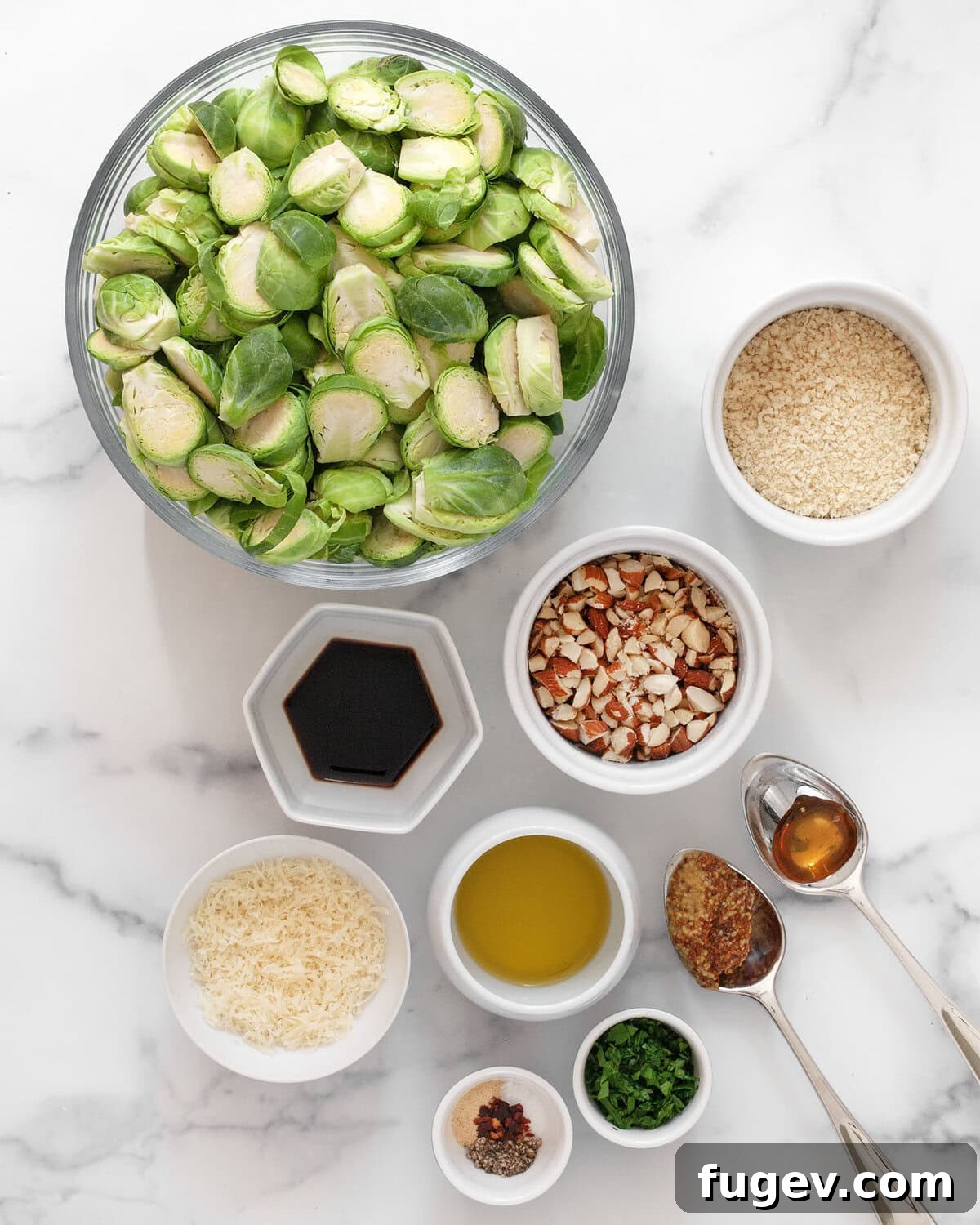 Caramelized Balsamic Sprouts 3 Ingredients for roasted balsamic brussels sprouts including fresh brussels sprouts, almonds, panko breadcrumbs, balsamic vinegar, olive oil, honey, various seasonings, parmesan cheese, and fresh parsley.