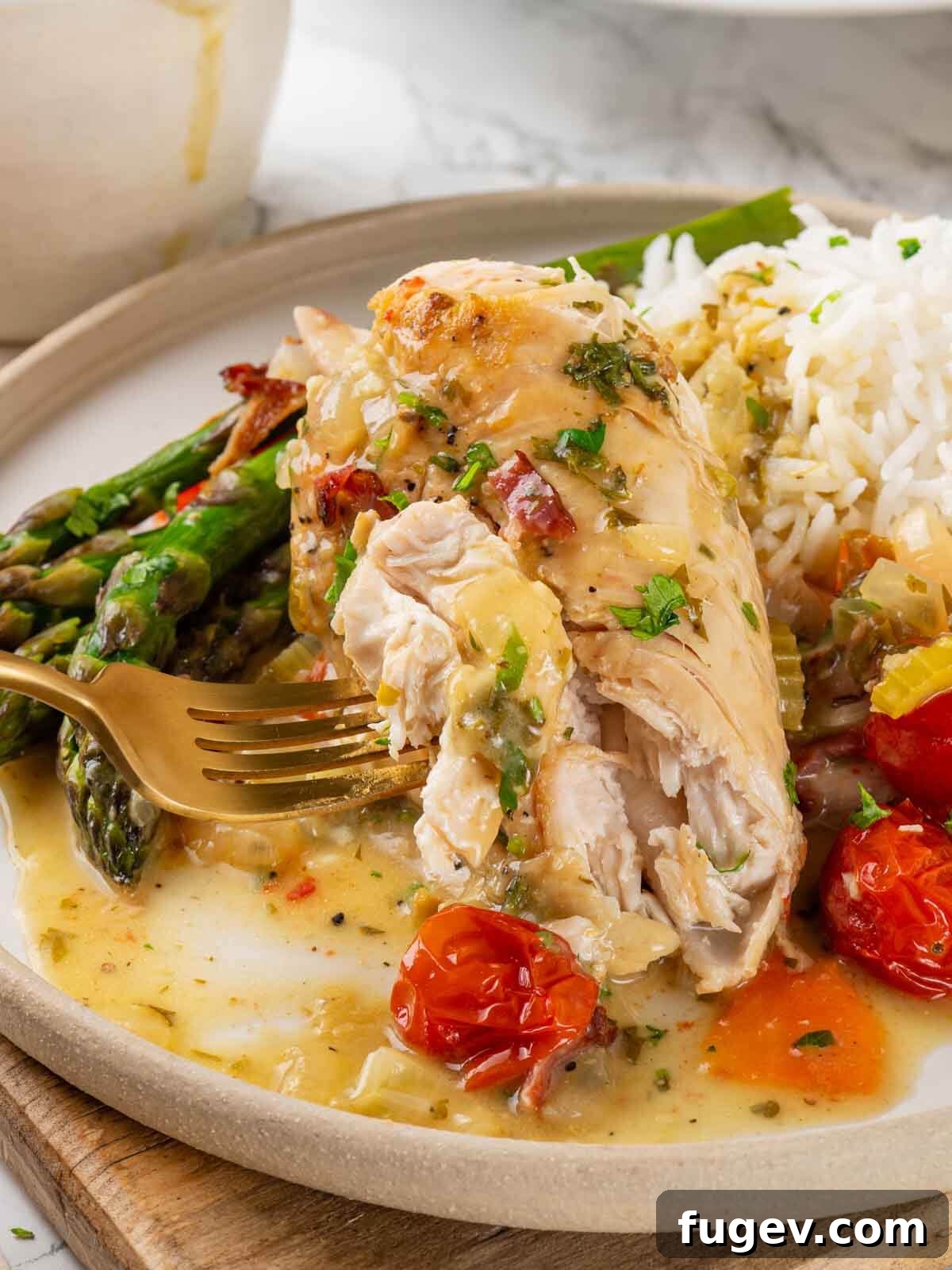 Bright White Wine Chicken 2 Golden-brown chicken in wine sauce with blistered tomatoes and fresh herbs, served with a gold fork, ready to eat.