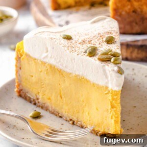 Pumpkin cheesecake on a beige plate.