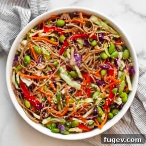 Cold Sesame Noodle Salad with packaged shredded cabbage and carrots, edamame, and bell peppers.
