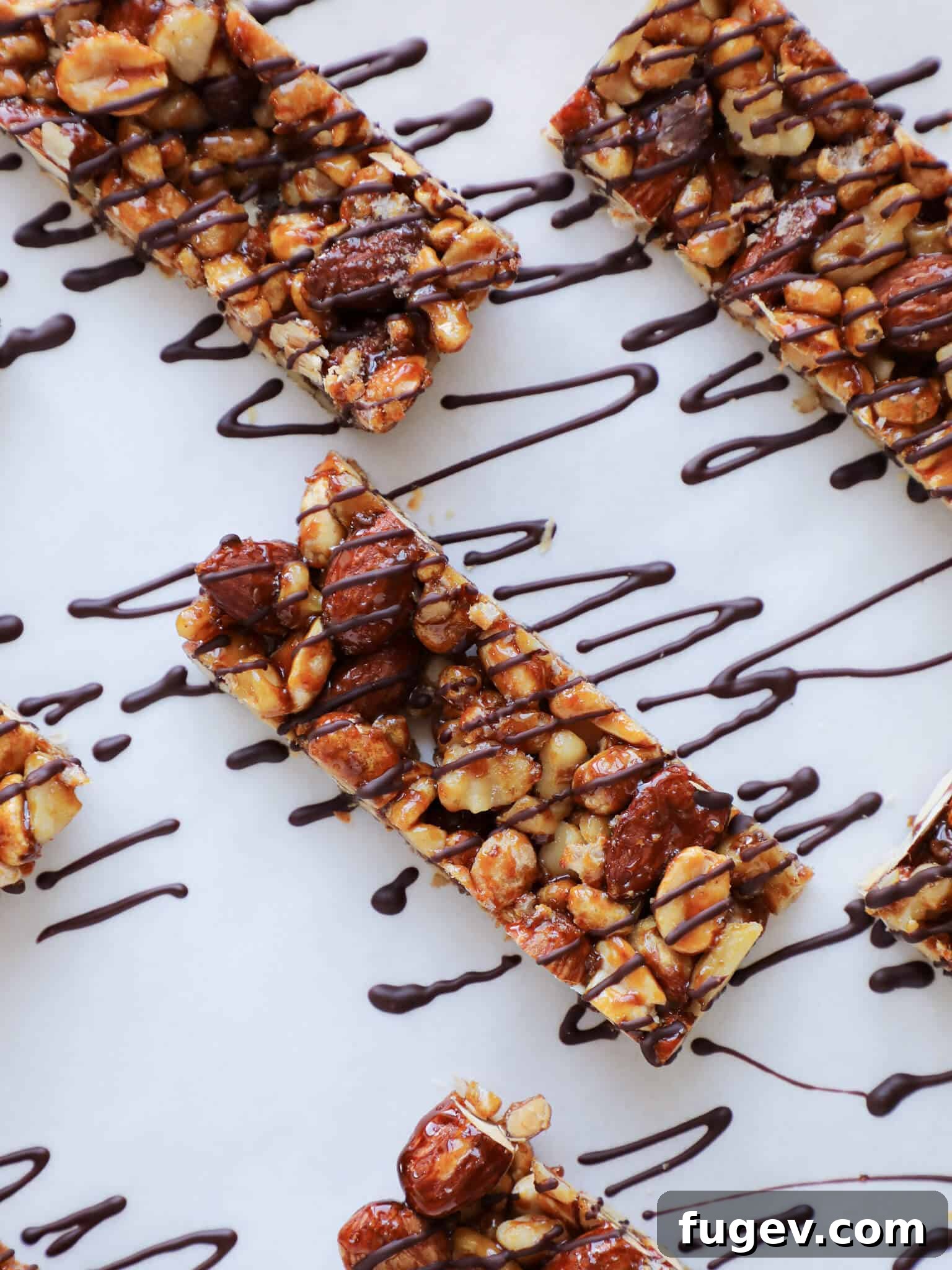 Craft Your Own KIND Bars 5 Homemade KIND bar sliced in half, revealing the nut and cereal interior.
