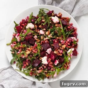 Roasted beet feta farro salad on a plate.
