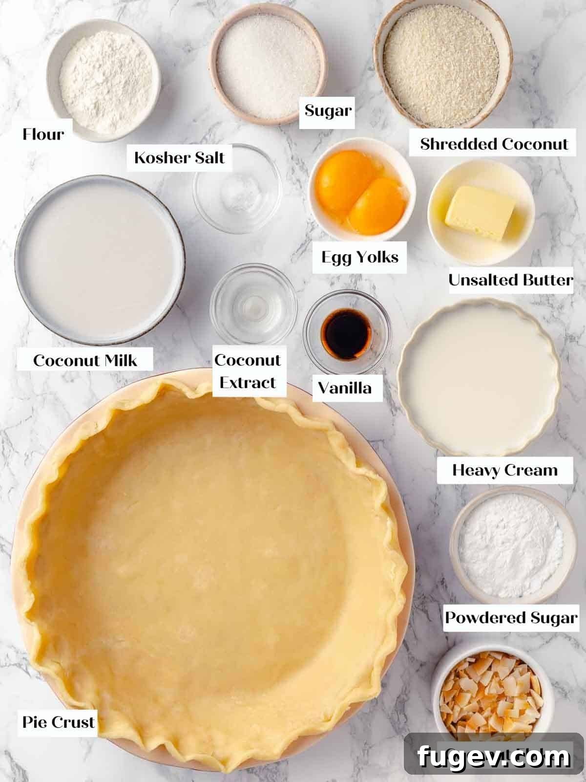 Luscious Coconut Cream Pie 4 A beautifully arranged display of fresh, high-quality ingredients for coconut cream pie on a pristine white marble countertop, highlighting readiness and gourmet appeal.