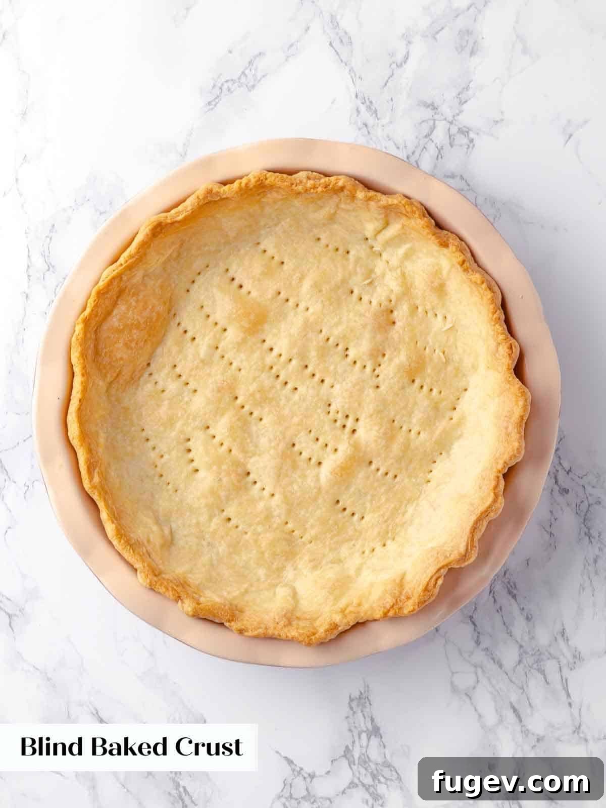 Luscious Coconut Cream Pie 5 A perfectly blind-baked pie crust, golden brown and crisp, sitting on a cooling rack, ready to be filled with the creamy coconut custard.