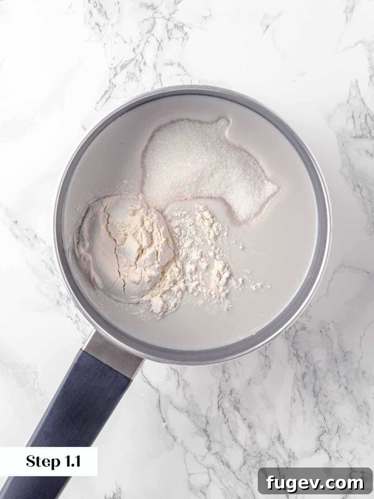 Luscious Coconut Cream Pie 6 Unsweetened coconut milk and flour being smoothly whisked together in a saucepan, beginning the process of creating the rich and creamy pie filling.