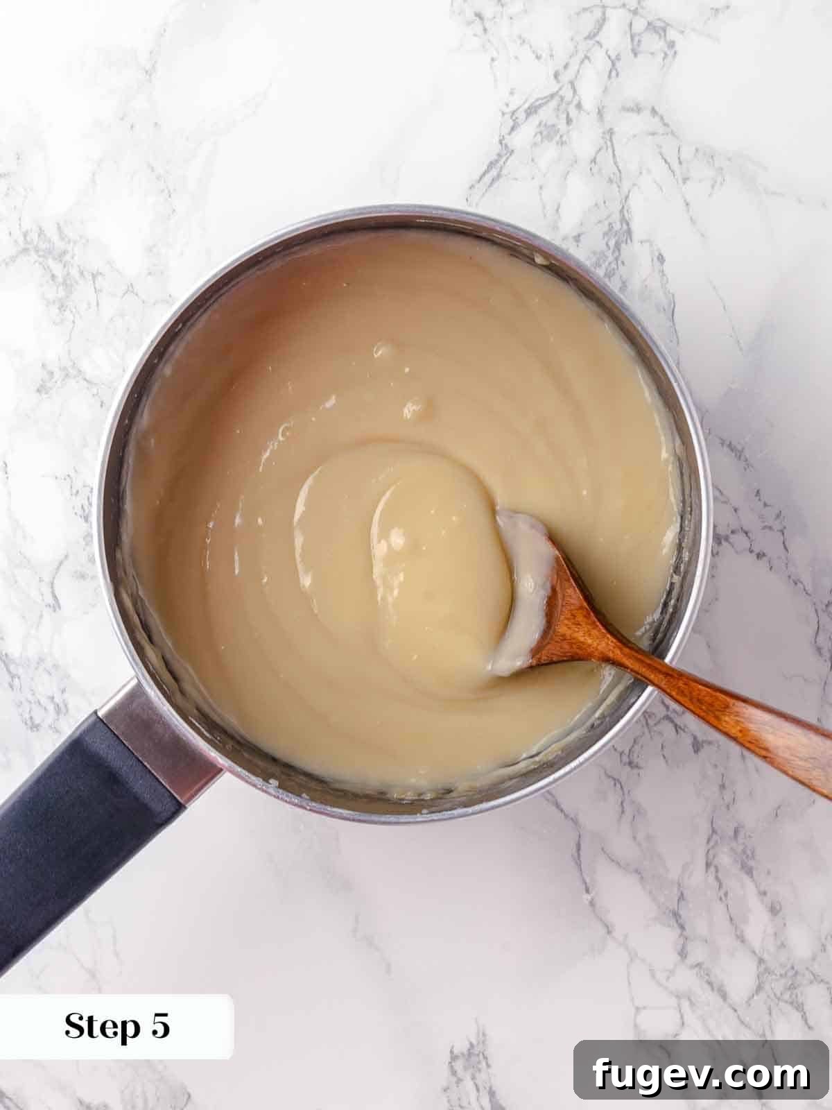 Luscious Coconut Cream Pie 9 The coconut cream filling has reached its perfect pudding-like consistency in the saucepan, thick, smooth, and ready for butter and coconut flakes.