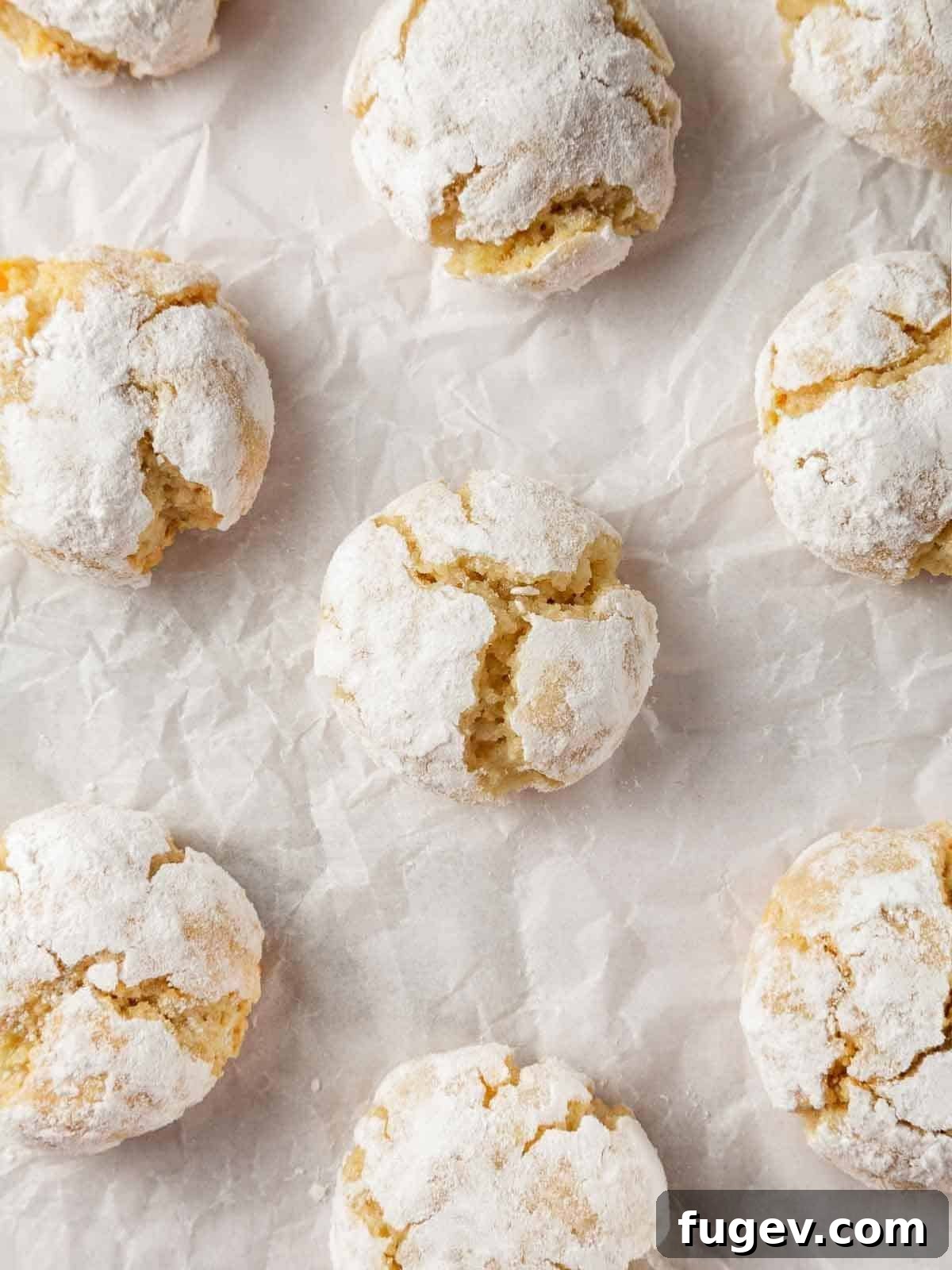 Italian Almond Amaretti 12 Close-up of a plate of perfectly baked soft amaretti cookies, showcasing their inviting texture.