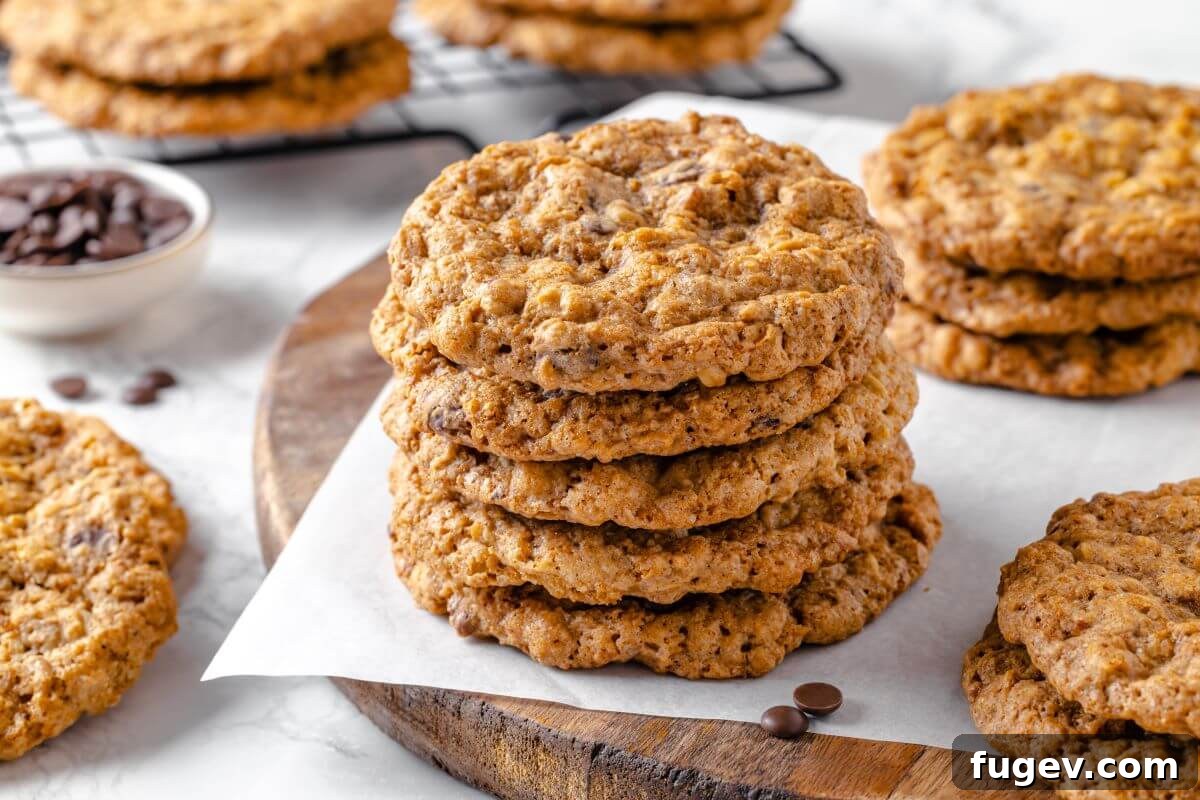 Hearty Cowboy Cookies 17 A delightful stack of freshly baked cowboy cookies, showcasing the visible chocolate chips, oats, and pecans, ready to be enjoyed as a perfect dessert or snack.