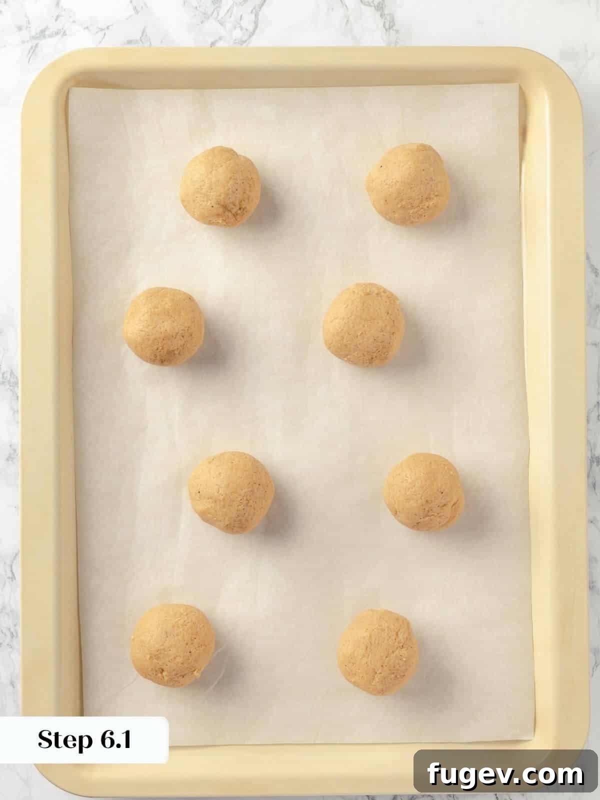 Chai-Spiced Sugar Cookies 14 Step 6 of making chai sugar cookies: baked cookies on parchment paper, fresh out of the oven.