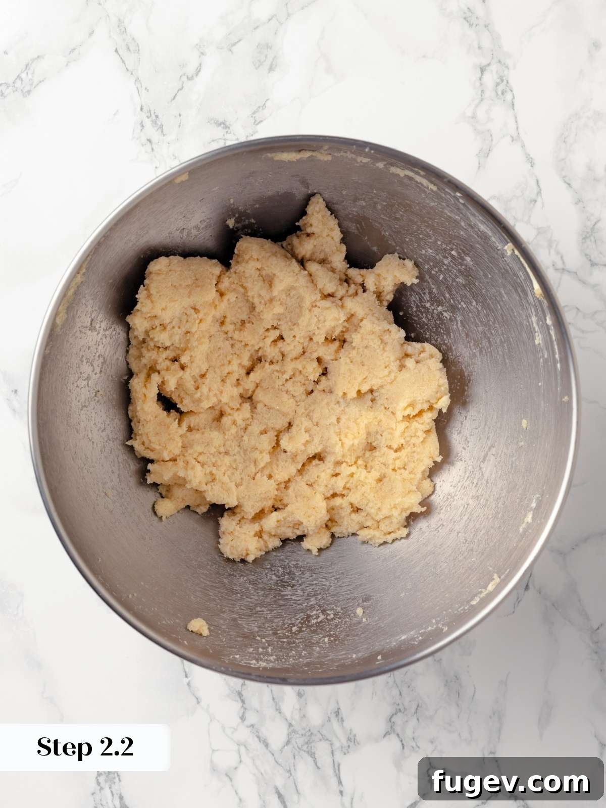 Chai-Spiced Sugar Cookies 8 Step 3 of making chai sugar cookies: gradually adding dry ingredients to the wet mixture.
